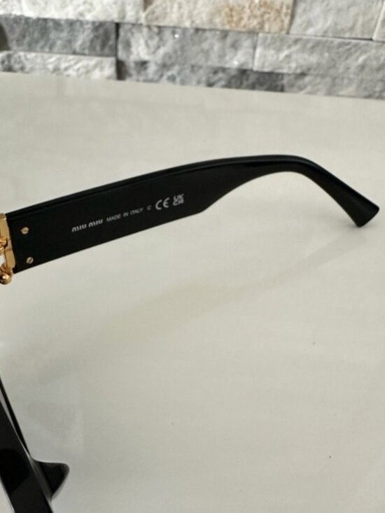 Miu Miu Black Sunglasses with Gold Accents